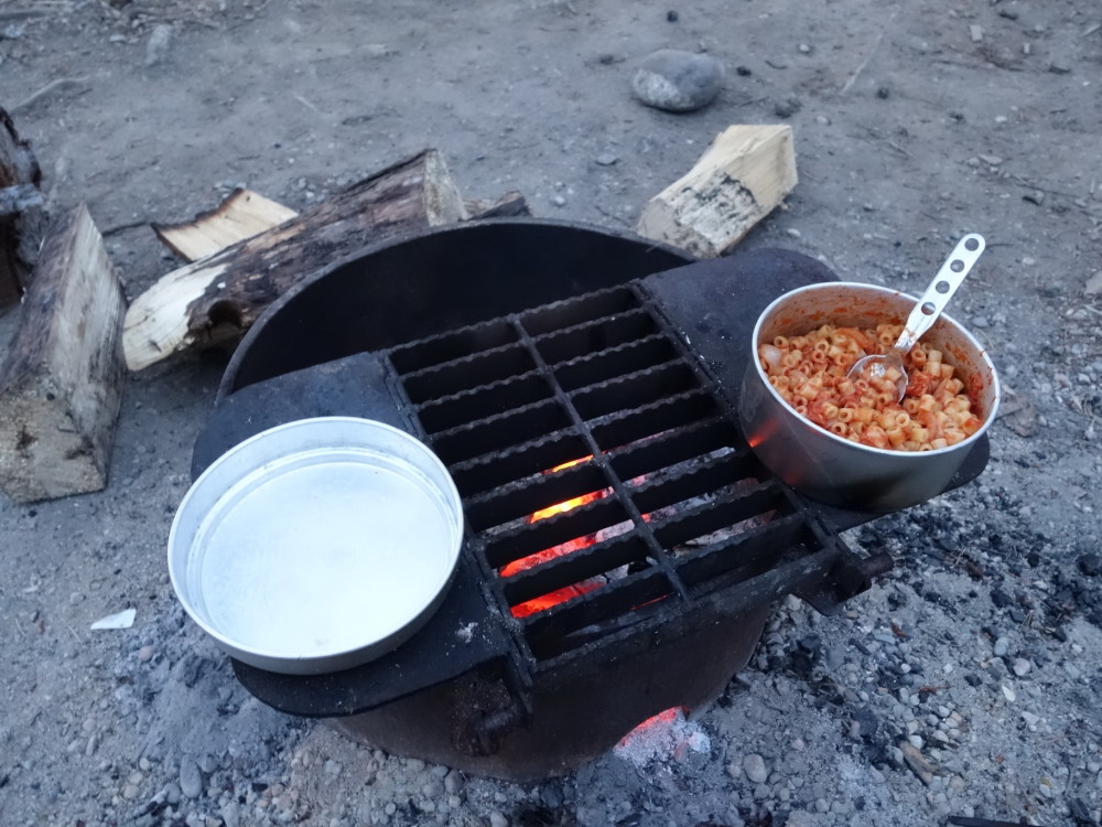 Pasta with tuna red sauce made in wood fire.
